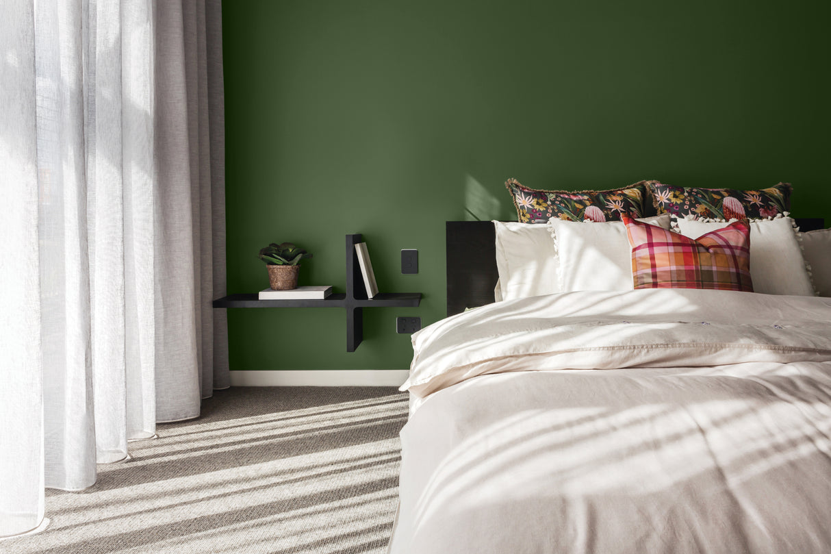 Lifestyle Image of Bedroom Wall Painted in Faerie Moss